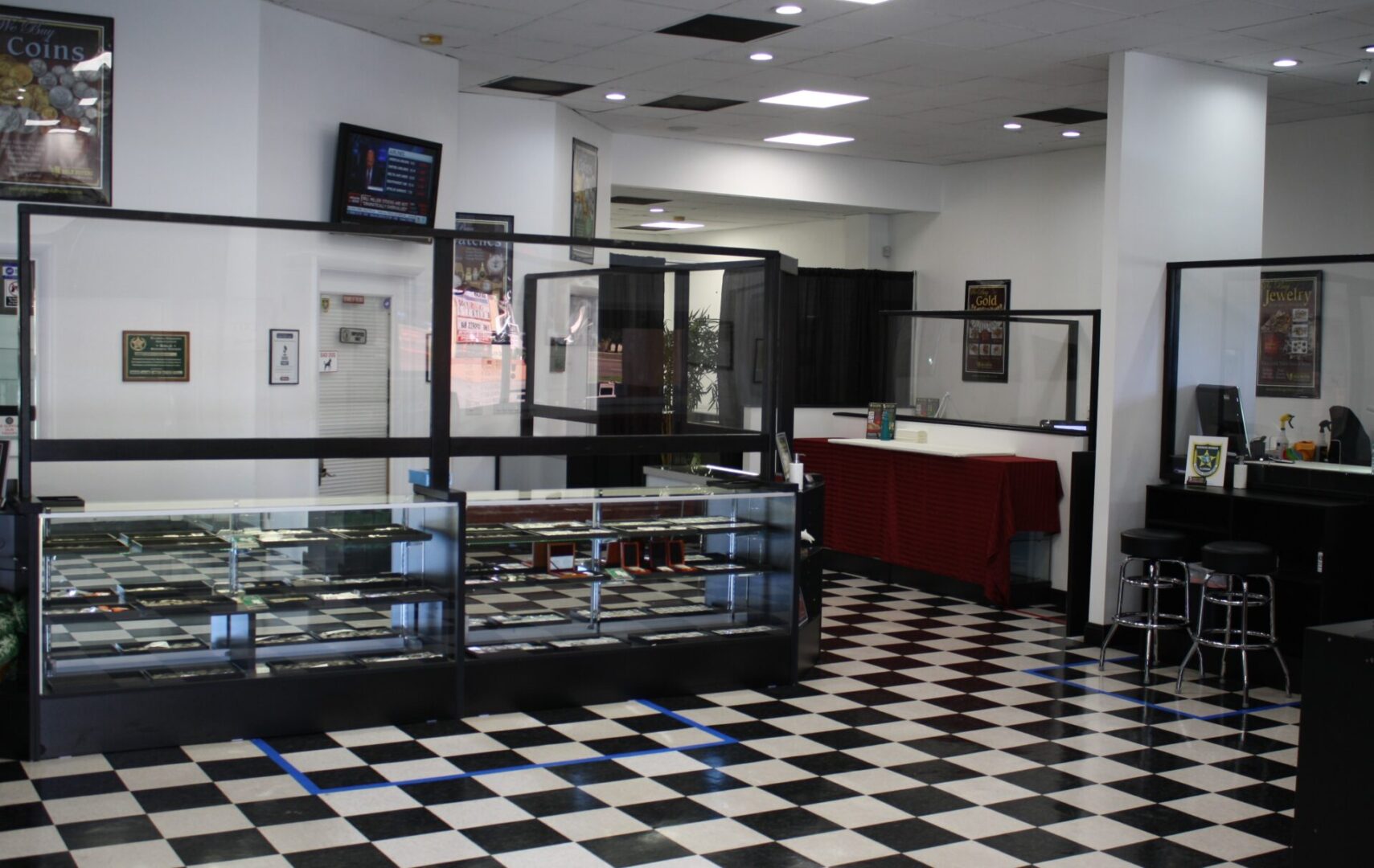 Store interior with glass display cases.